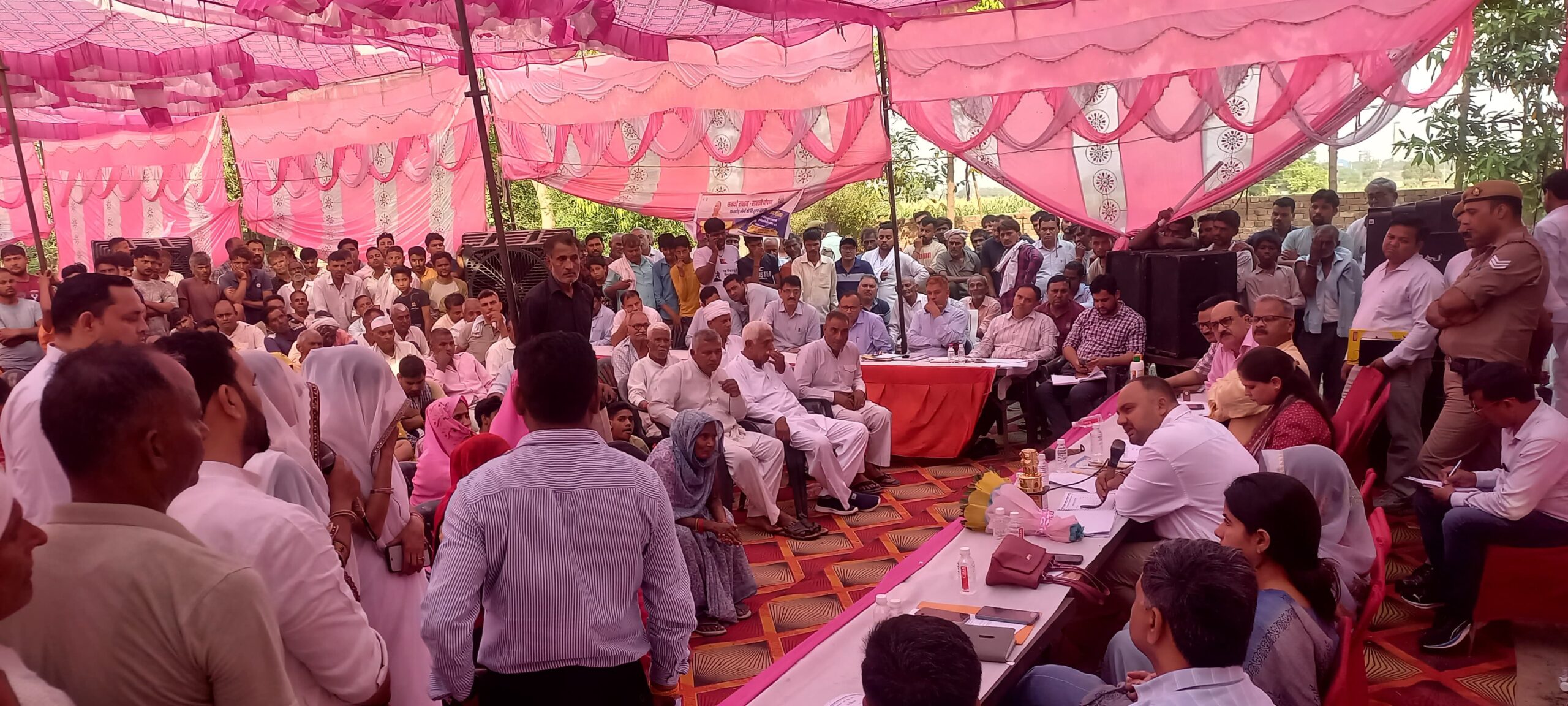 Organizing a public meeting : जिलाधिकारी की अध्यक्षता में हुई ग्राम हरसिंहपुर बृजनाथपुर में जन चौपाल का आयोजन ?